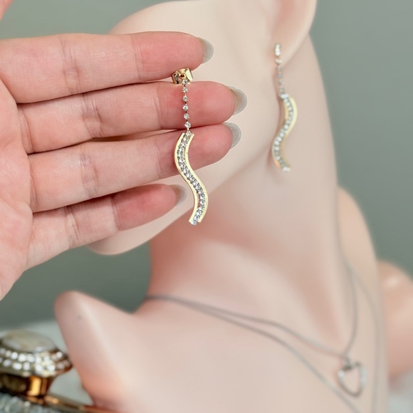 Elegant Gold and Silver Wave Earrings - Picture 8 of 10